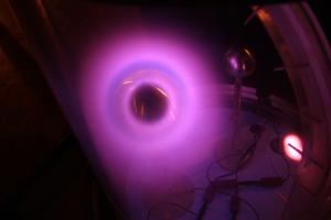 Plasma glow of a Van de Graaff generator.