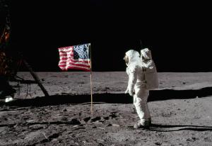 Buzz Aldrin salutes the U.S. flag while standing on the Moon.