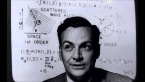 Richard Feynmann giving a physics lecture.