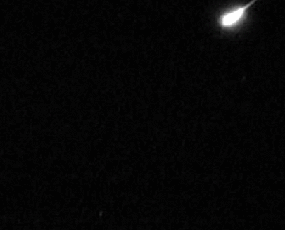 A meteor streaking through the sky.