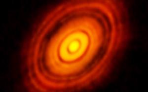 We can now observe planets forming around other stars. Data gathered at ALMA, and funded by NSF.