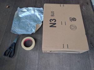 Materials needed to build a pinhole camera.