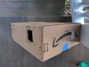 Two holes are cut into the box. One for the pinhole, and one for viewing. The pinhole should be placed on the short side of the box.