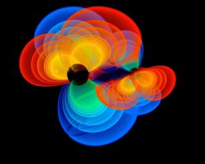 This computer simulation shows two black holes that are merging.