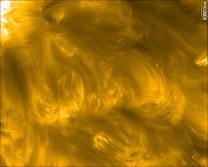 Arched loops of solar plasma that heat the Sun's corona.