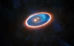 Artist view of planets forming around a binary star.