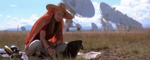 Ellie listens for aliens, from the movie Contact.