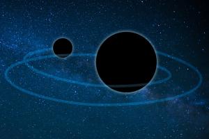 Illustration of two merging black holes.