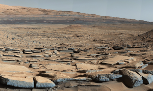 An image from the Curiosity rover showing sediment layers of an ancient lake.