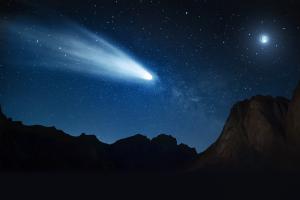 An artist rendering of a comet passing near Earth.