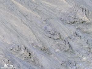 New observations of recurring slope lineae show they behave more like dust than water.