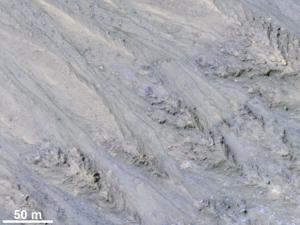 New observations of recurring slope lineae show they behave more like dust than water.