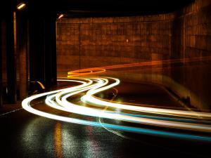 An exposure of car lights in a tunnel.