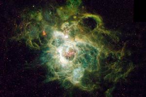 Hubble Space Telescope image of a vast nebula called NGC 604, which is rich in helium.