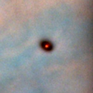 A young star surrounded by a protoplanetary disc.