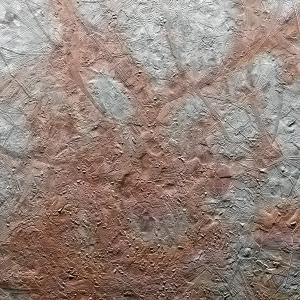 Cracks on the icy surface of Europa.