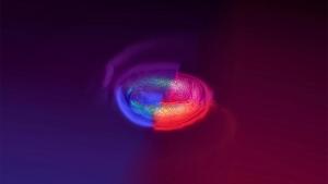 A simulation of a neutron star merger, with two two stars colored red and blue.