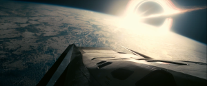 A spacecraft approachs a black hole in Interstellar.