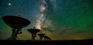 Antennas of the Very Large Array against the Milky Way.