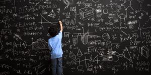 Illustration of a boy at a blackboard.