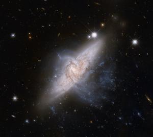 A pair of overlapping galaxies called NGC 3314.