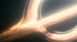 A screenshot from the movie *Interstellar* showing how light is warped by the fictional black hole Gargantua.