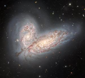 These two colliding galaxies may eventually become a PRG.