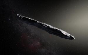 This artist’s impression shows the first interstellar asteroid: `Oumuamua.