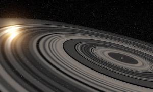 An artist's rendition of the gigantic ring system circling J1407b.