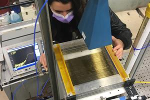 Mackenzie Wooten with a prototype of a wire-array.