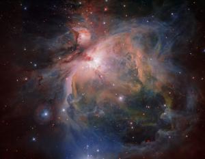 The spectacular Orion Nebula and its associated cluster of young stars.