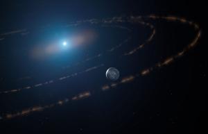 An artist’s impression of the white dwarf star WD1054–226 orbited by clouds of planetary debris and a major planet in the habitable zone.