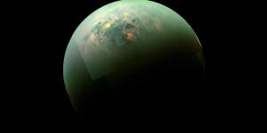 A near-infrared view of Titan showing its glinting seas.