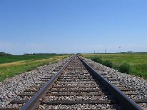 Train tracks appear to emanate from a single point.