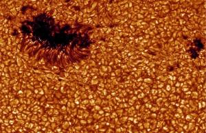 View of a sunspot and granules on the Sun.