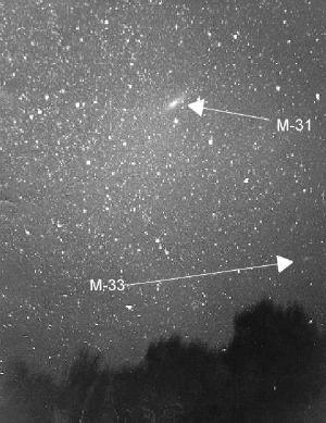 M-31 and M-33 as they might appear to the naked eye.